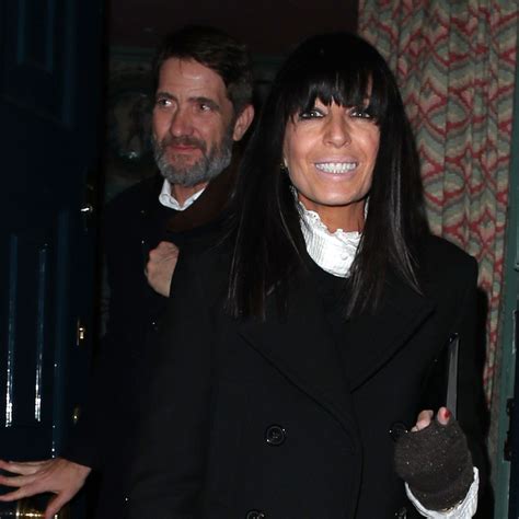 Claudia Winkleman oozes chic in black blazer and killer boots。